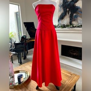 Red evening wear long satin skirt and top with matching wrap and small purse